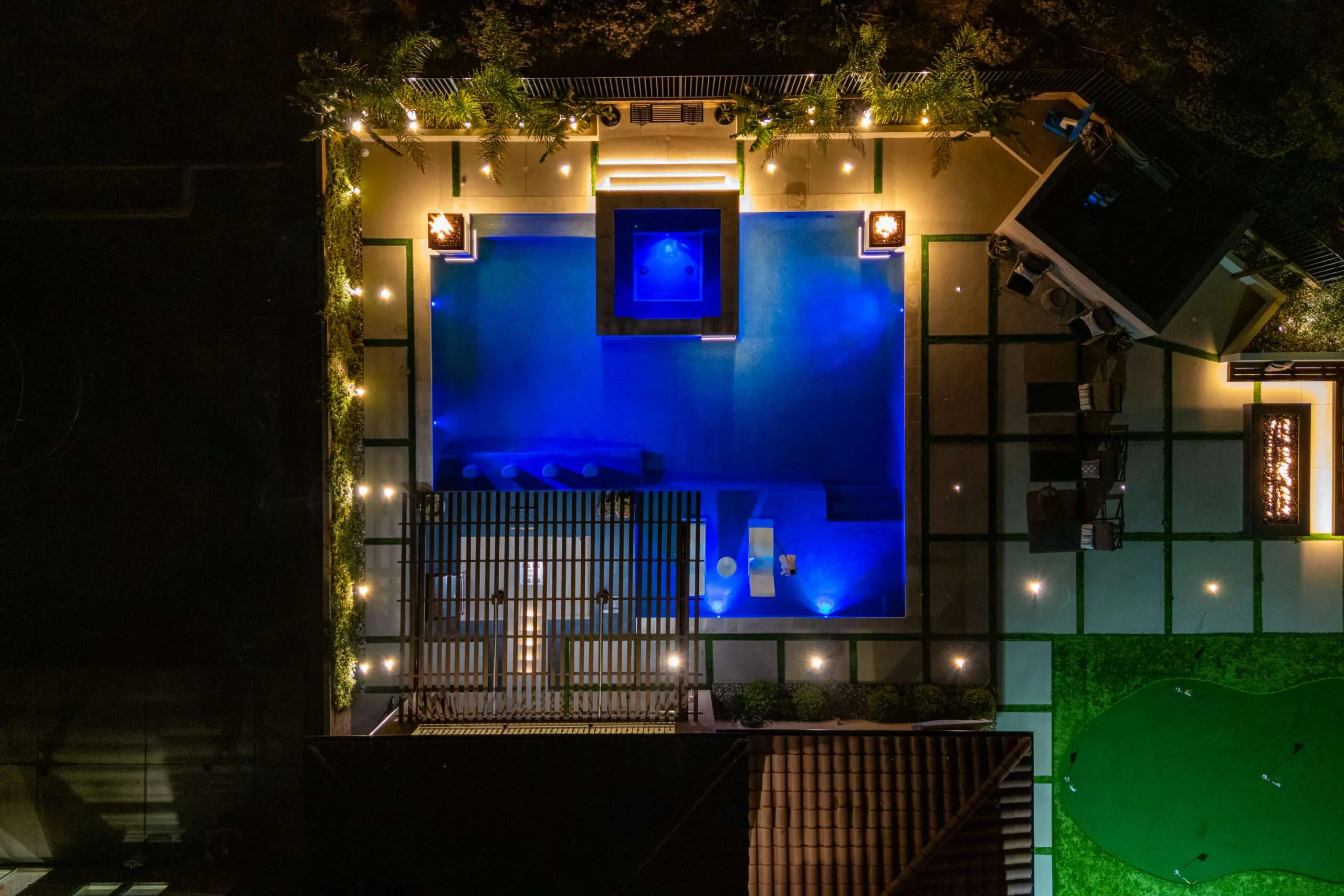 Aerial pool view with blue lighting